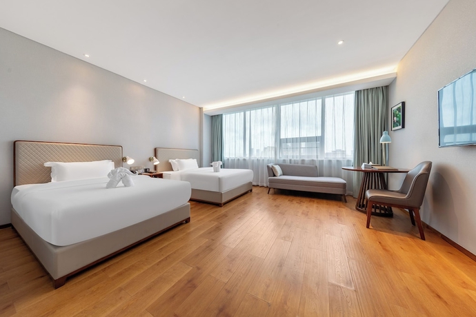 Imagen de la habitación del Hotel Hainan Berun hotel. Foto 4