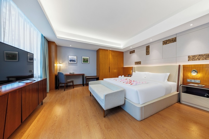 Imagen de la habitación del Hotel Hainan Berun hotel. Foto 9