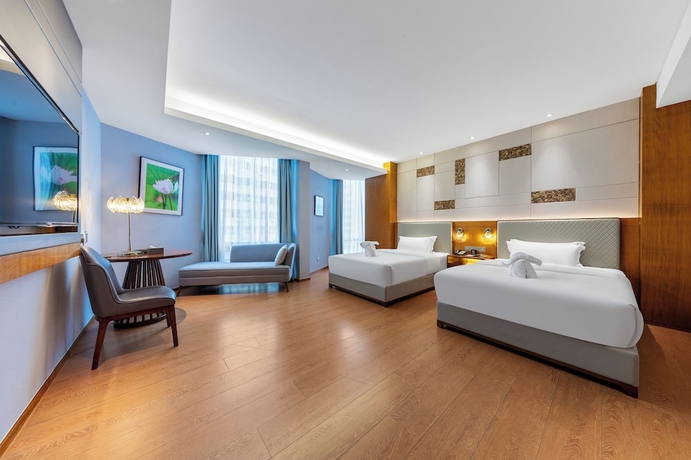 Imagen de la habitación del Hotel Hainan Berun hotel. Foto 15