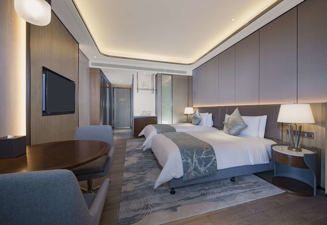 Imagen de la habitación del Hotel Hainan Blue Horizon Jun Hua. Foto 4