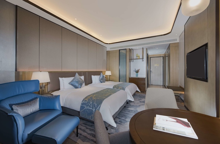 Imagen de la habitación del Hotel Hainan Blue Horizon Jun Hua. Foto 5