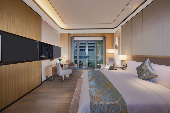 Imagen de la habitación del Hotel Hainan Blue Horizon Jun Hua. Foto 6