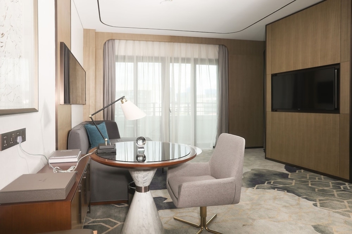 Imagen de la habitación del Hotel Hainan Blue Horizon Jun Hua. Foto 7