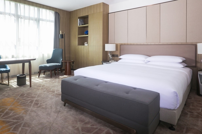 Imagen de la habitación del Hotel Hainan Blue Horizon Jun Hua. Foto 9