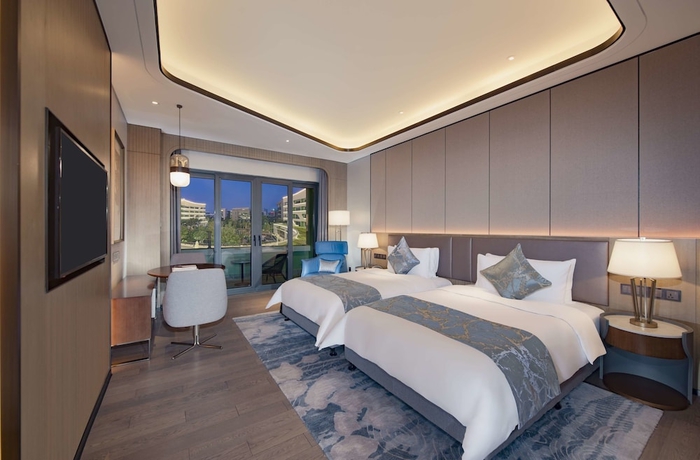 Imagen de la habitación del Hotel Hainan Blue Horizon Jun Hua. Foto 10