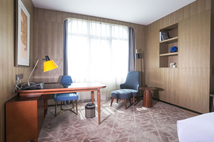 Imagen de la habitación del Hotel Hainan Blue Horizon Jun Hua. Foto 12