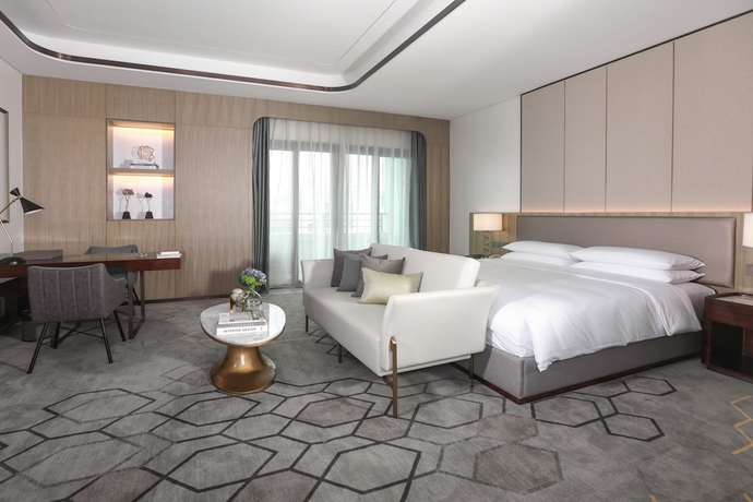 Imagen de la habitación del Hotel Hainan Blue Horizon Jun Hua. Foto 13