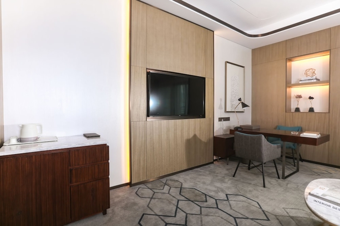 Imagen de la habitación del Hotel Hainan Blue Horizon Jun Hua. Foto 14