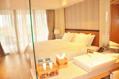 Imagen de la habitación del Hotel Hainan Greentown Blue Bay Resort，. Foto 2