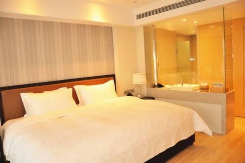 Imagen de la habitación del Hotel Hainan Greentown Blue Bay Resort，. Foto 4
