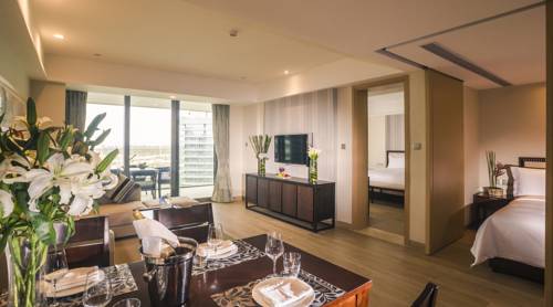 Imagen de la habitación del Hotel Hainan Greentown Blue Bay Resort，. Foto 5