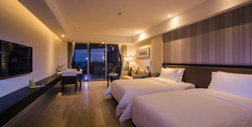 Imagen de la habitación del Hotel Hainan Greentown Blue Bay Resort，. Foto 6