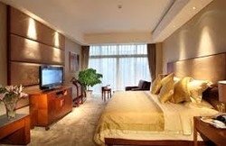Imagen de la habitación del Hotel Hainan Guest House. Foto 4
