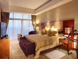 Imagen de la habitación del Hotel Hainan Guest House. Foto 5