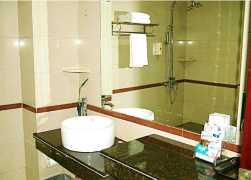 Imagen de la habitación del Hotel Hainan Jingshan. Foto 6