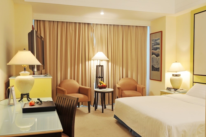 Imagen de la habitación del Hotel Hainan Junhua Haiyi. Foto 6