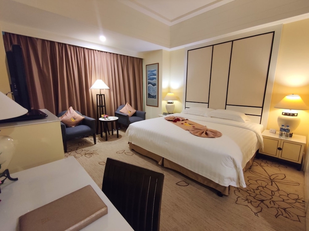 Imagen de la habitación del Hotel Hainan Junhua Haiyi. Foto 7