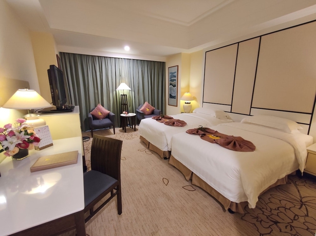 Imagen de la habitación del Hotel Hainan Junhua Haiyi. Foto 8
