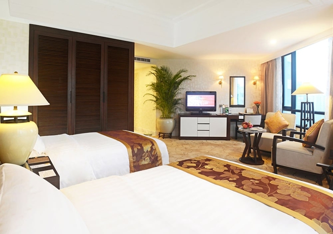 Imagen de la habitación del Hotel Hainan Junhua Haiyi. Foto 11