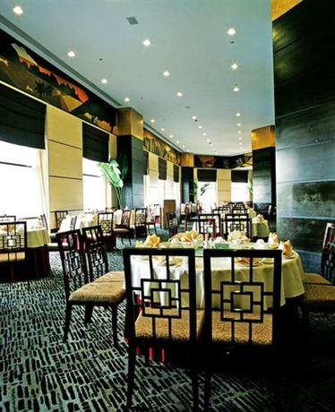 Imagen del bar/restaurante del Hotel Hainan Junhua Haiyi. Foto 5