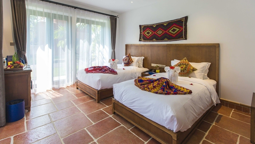 Imagen de la habitación del Hotel Hainan Xikang Wellness and Resorts. Foto 6