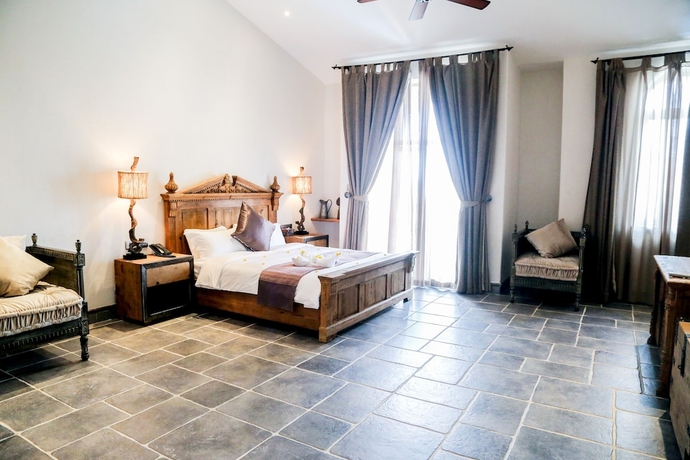 Imagen de la habitación del Hotel Hainan Xikang Wellness and Resorts. Foto 11