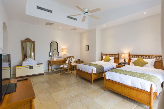 Imagen de la habitación del Hotel Hainan Xikang Wellness and Resorts. Foto 15