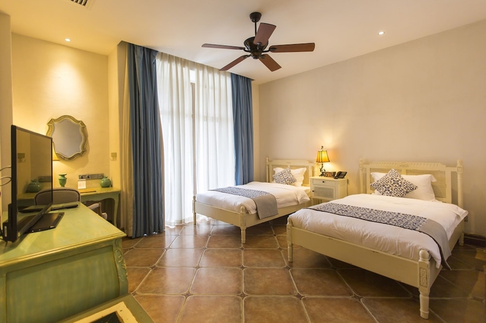 Imagen de la habitación del Hotel Hainan Xikang Wellness and Resorts. Foto 16