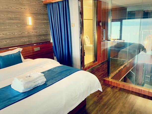 Imagen de la habitación del Hotel Haiquanxi Holiday Apartment. Foto 11