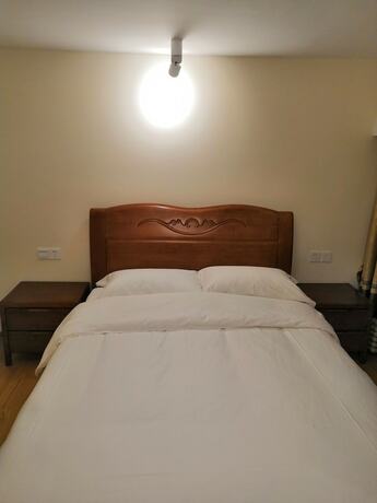 Imagen de la habitación del Hotel Haiquanxi Holiday Apartment. Foto 13