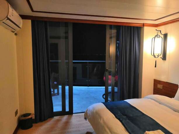 Imagen de la habitación del Hotel Haiquanxi Holiday Apartment. Foto 16