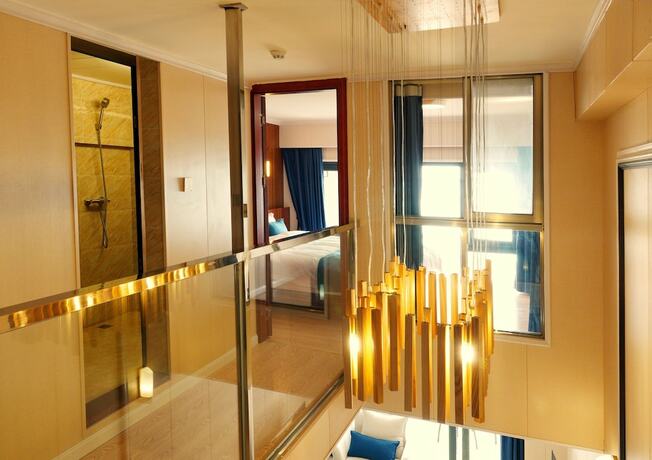 Imagen de la habitación del Hotel Haiquanxi Holiday Apartment. Foto 18