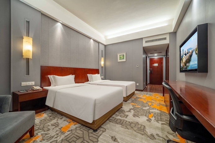 Imagen de la habitación del Hotel Haiwaihai Baina Hotel. Foto 3