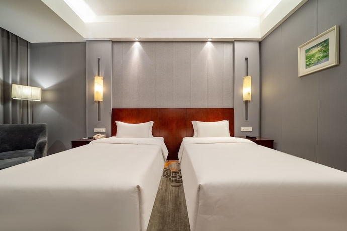 Imagen de la habitación del Hotel Haiwaihai Baina Hotel. Foto 4
