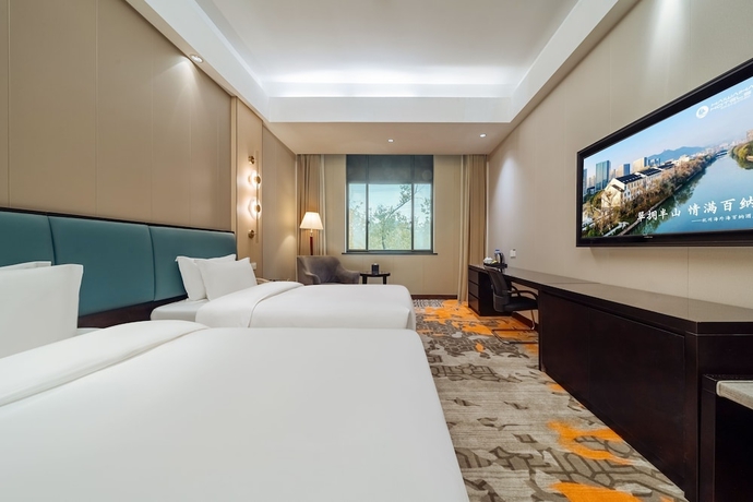 Imagen de la habitación del Hotel Haiwaihai Baina Hotel. Foto 5