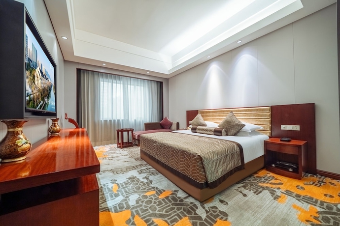 Imagen de la habitación del Hotel Haiwaihai Baina Hotel. Foto 10