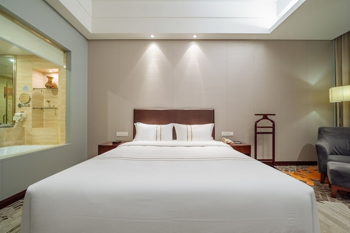 Imagen de la habitación del Hotel Haiwaihai Baina Hotel. Foto 11
