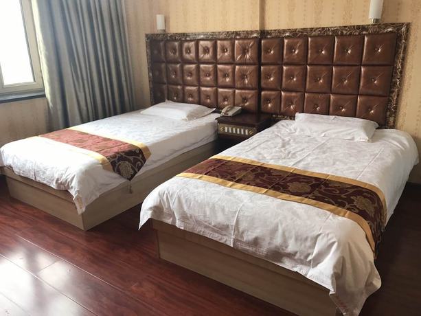 Imagen de la habitación del Hotel Haiwangfu. Foto 3