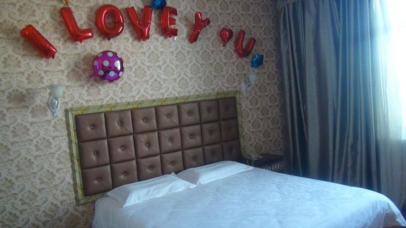 Imagen de la habitación del Hotel Haiwangfu. Foto 4