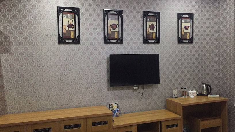 Imagen de la habitación del Hotel Haiwangfu. Foto 6