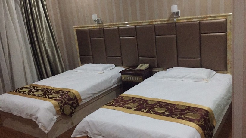 Imagen de la habitación del Hotel Haiwangfu. Foto 10