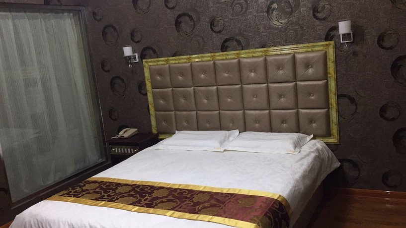 Imagen de la habitación del Hotel Haiwangfu. Foto 11