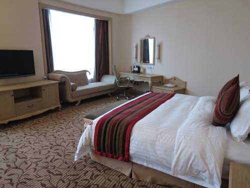 Imagen de la habitación del Hotel Haiyuan International -putian. Foto 7