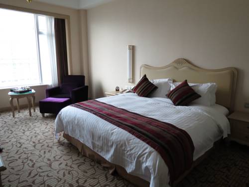 Imagen de la habitación del Hotel Haiyuan International -putian. Foto 10