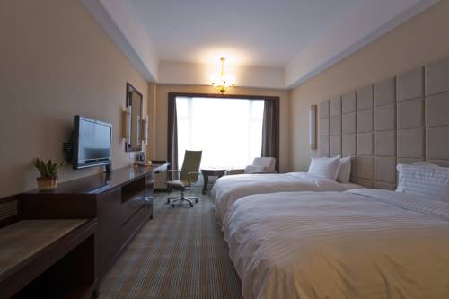 Imagen de la habitación del Hotel Haiyuan International -putian. Foto 11