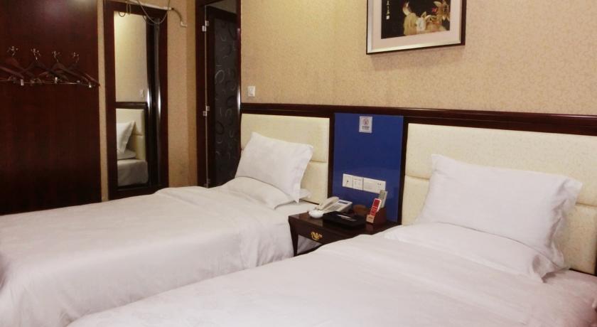 Imagen de la habitación del Hotel Haiyue, Guangzhou. Foto 6