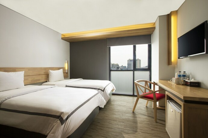 Imagen de la habitación del Hotel Ha-ka Semarang Managed By Parador. Foto 32