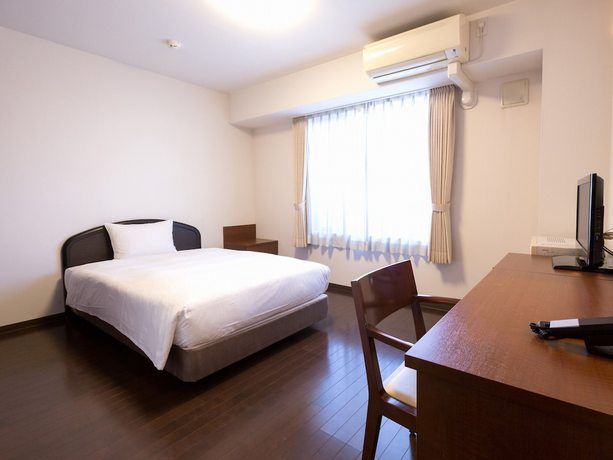 Imagen de la habitación del Hotel Hakata Place. Foto 9