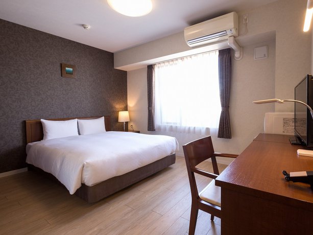 Imagen de la habitación del Hotel Hakata Place. Foto 13