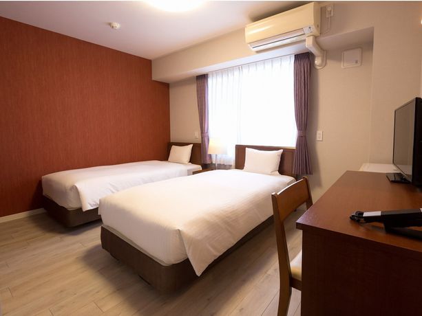 Imagen de la habitación del Hotel Hakata Place. Foto 14